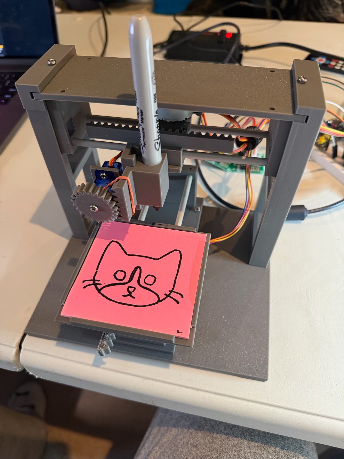 The plotter with the finished drawing