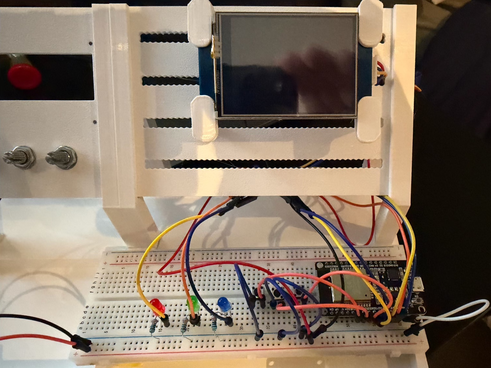 LED Blink Sequence in the rig: the ESP32 at the right end of the long breadboard, below the Nextion on the back panel, the OFF / ON / MODE buttons, and the red, green and blue LEDs with their resistors to the rail